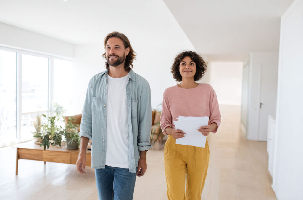 A friendly visit during a property tour, where clients explore Italian homes with the guidance of a bilingual consultant.