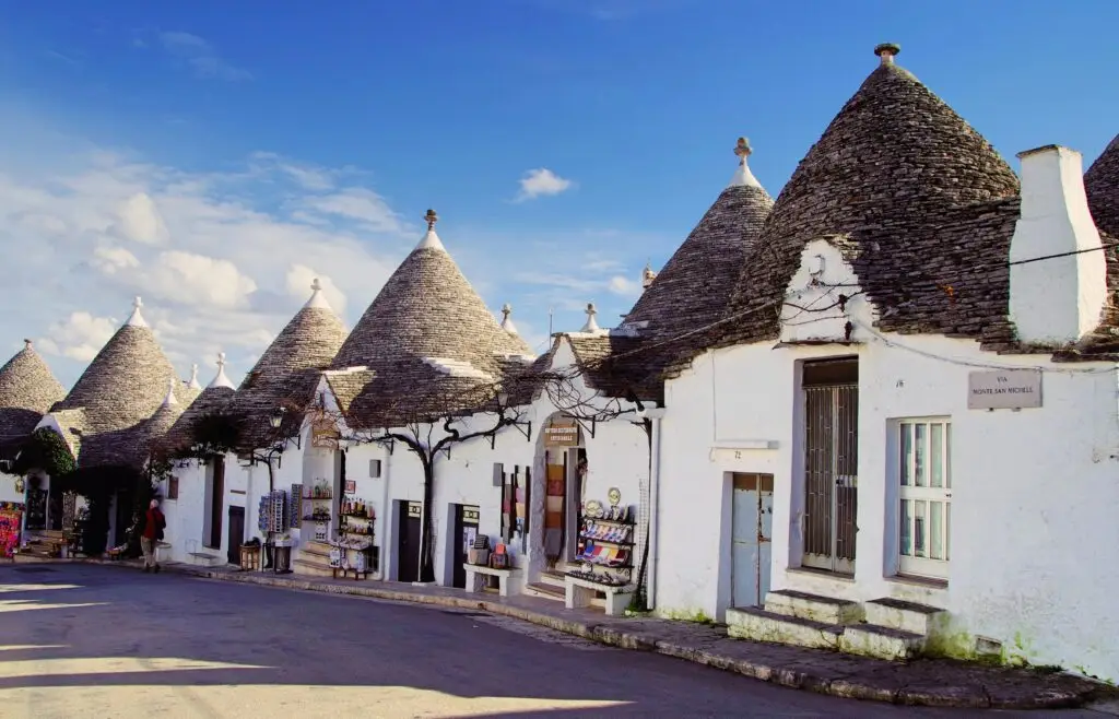 Explore the unique trulli houses in Alberobello, a picturesque town with traditional architecture.